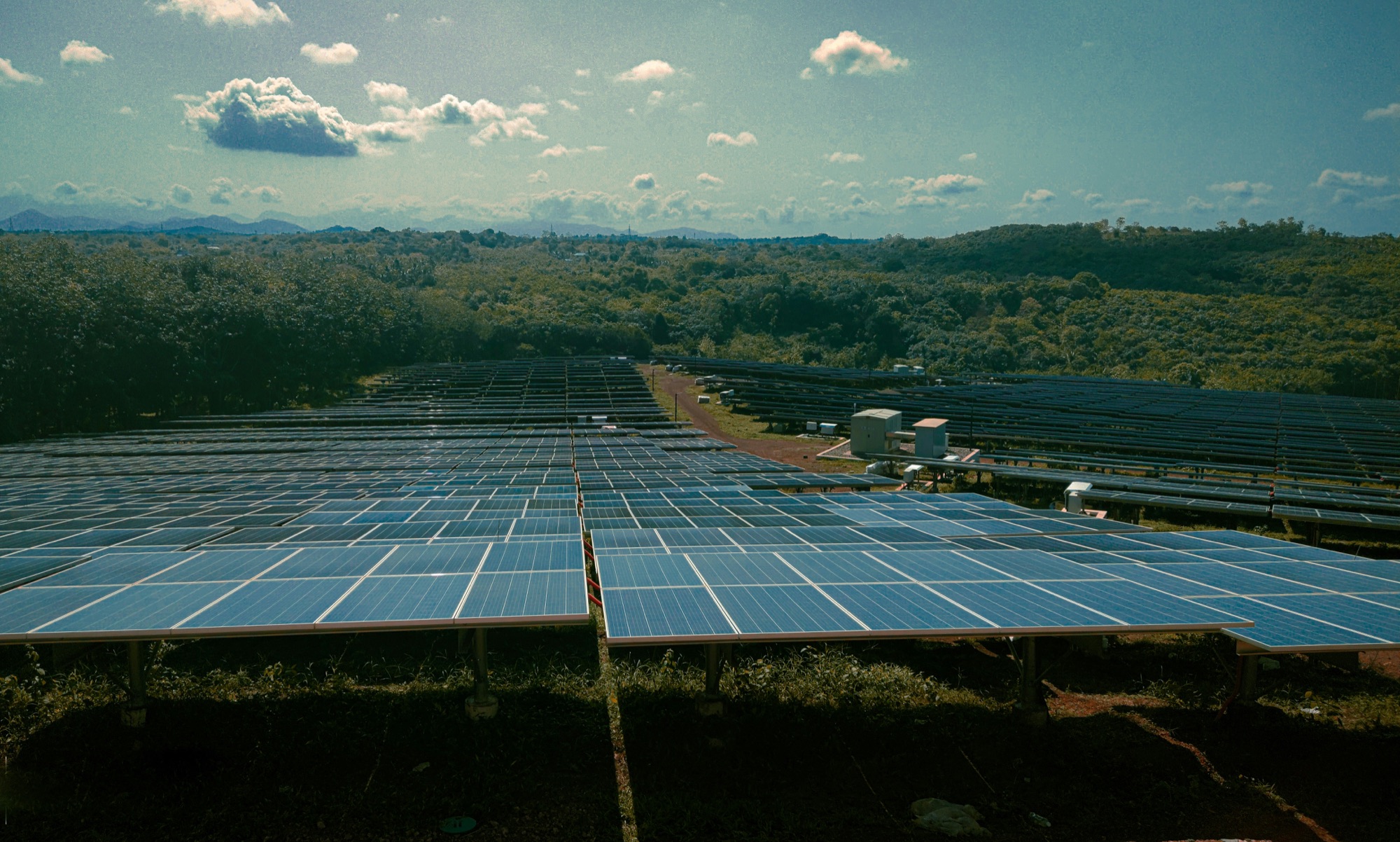Utility-scale solar farm embedded in the landscape